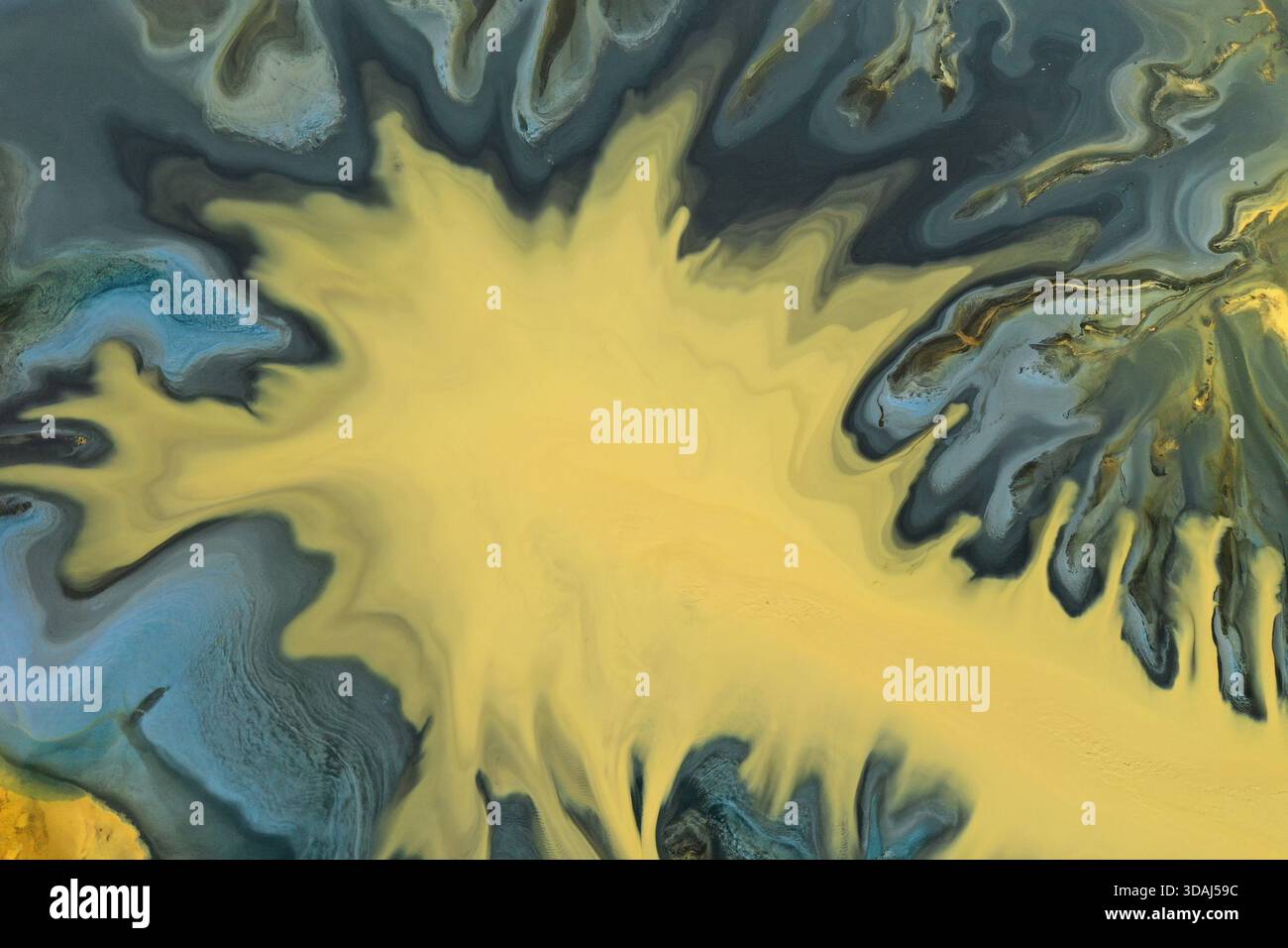 Natural Fluid Pattern Aerial view of colorful natural water patterns. Mining water pollution ...