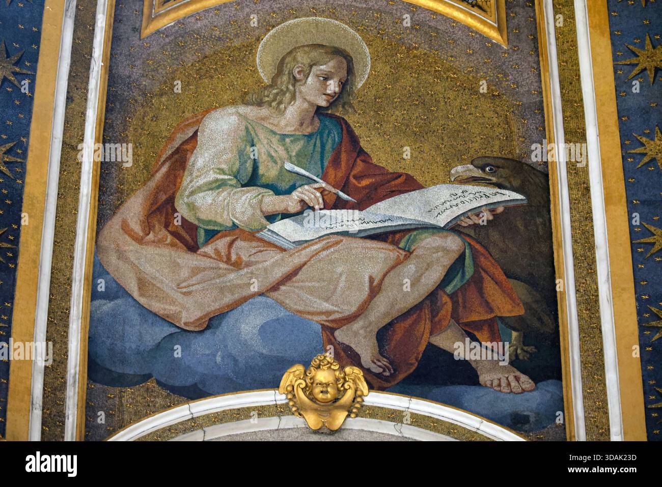 St. Peter’s Basilica. John is traditionally depicted with an eagle, symbolizing divinity and the lofty nature of his Gospel. Stock Photo