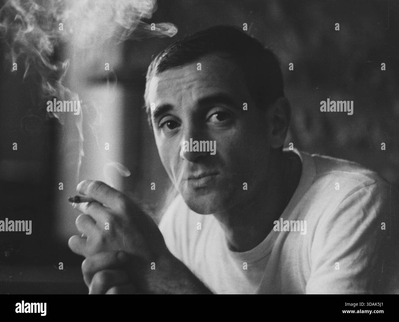 Smoking a cigarette Black and White Stock Photos & Images