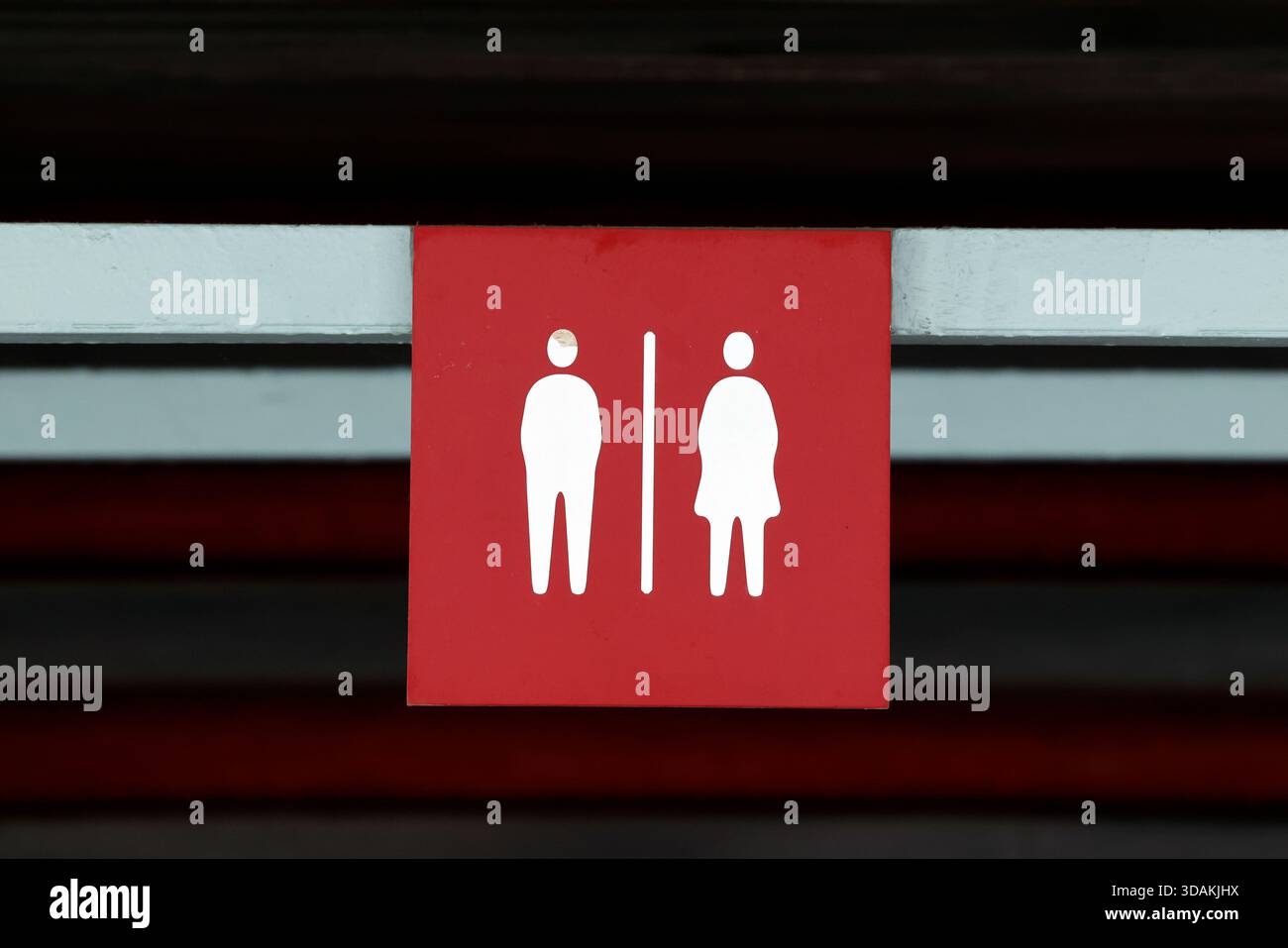 Red pictogram. Restroom sign. Man and woman. Stock Photo