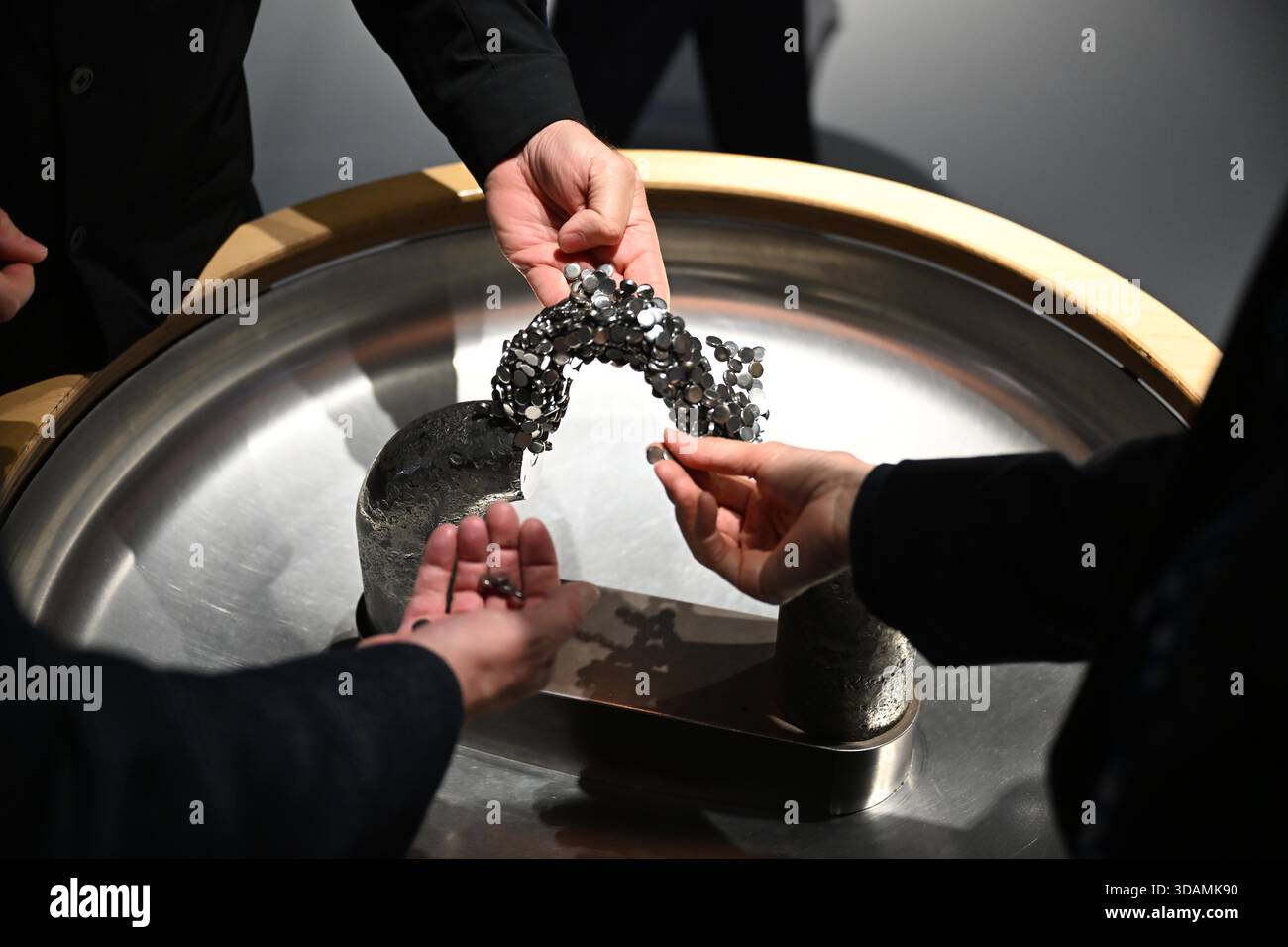 Wolfsburg, Germany. 11th Dec, 2025. View of an interactive magnet station at the phaeno exhibition. Following the renovation, the science museum is showing around 200 revised exhibits, 50 new exhibits and a completely redesigned exhibition landscape. Credit: Shireen Broszies/dpa/Alamy Live News Stock Photo