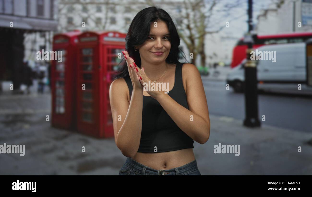 Woman clapping hands on urban hi-res stock photography and images - Alamy