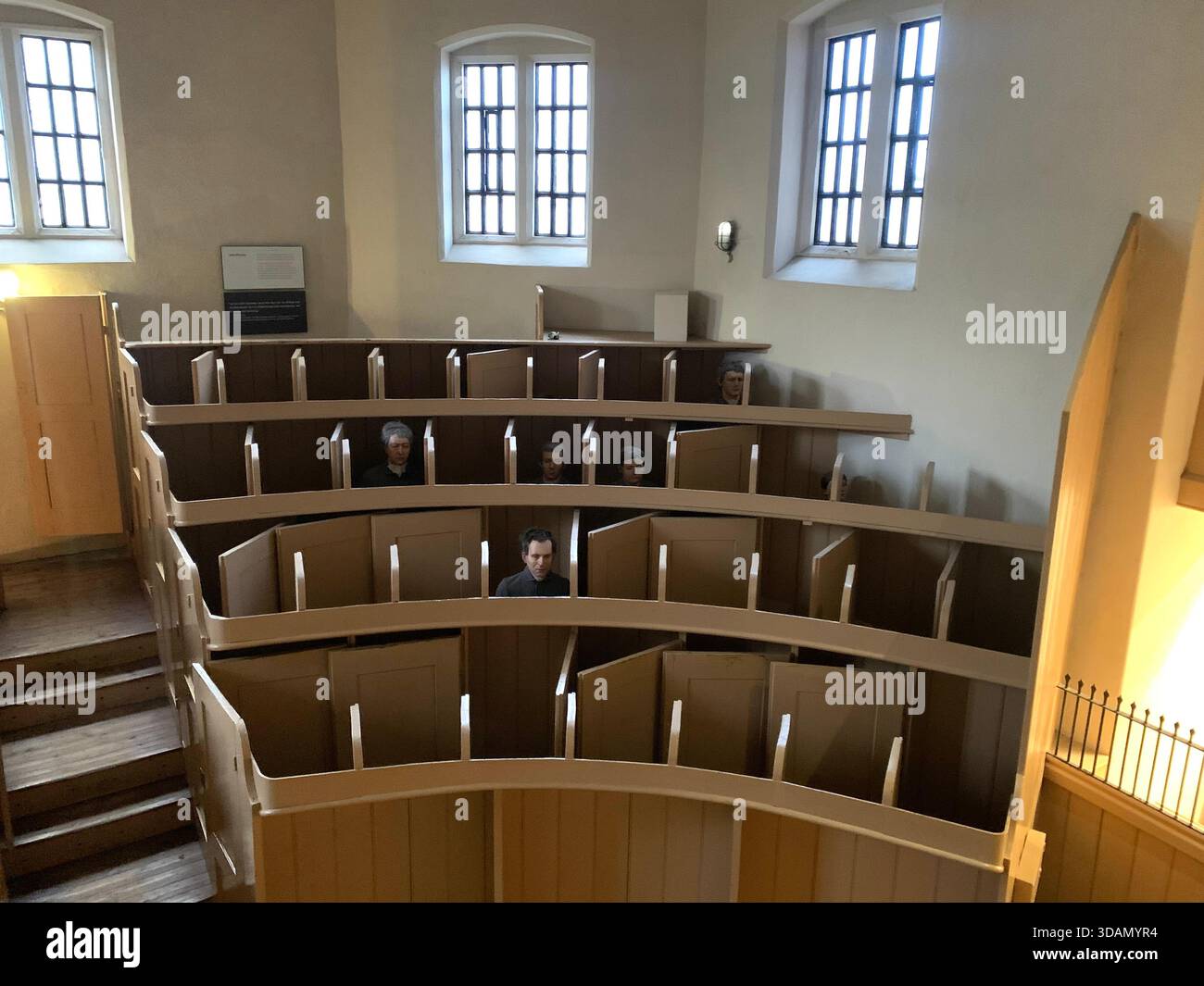 Lincoln Jail Prison Castle Church Chapel old style type prisoners dock god holly Christian service inside female type segregated cell cells gantry in - Smartphone Captured Stock Image