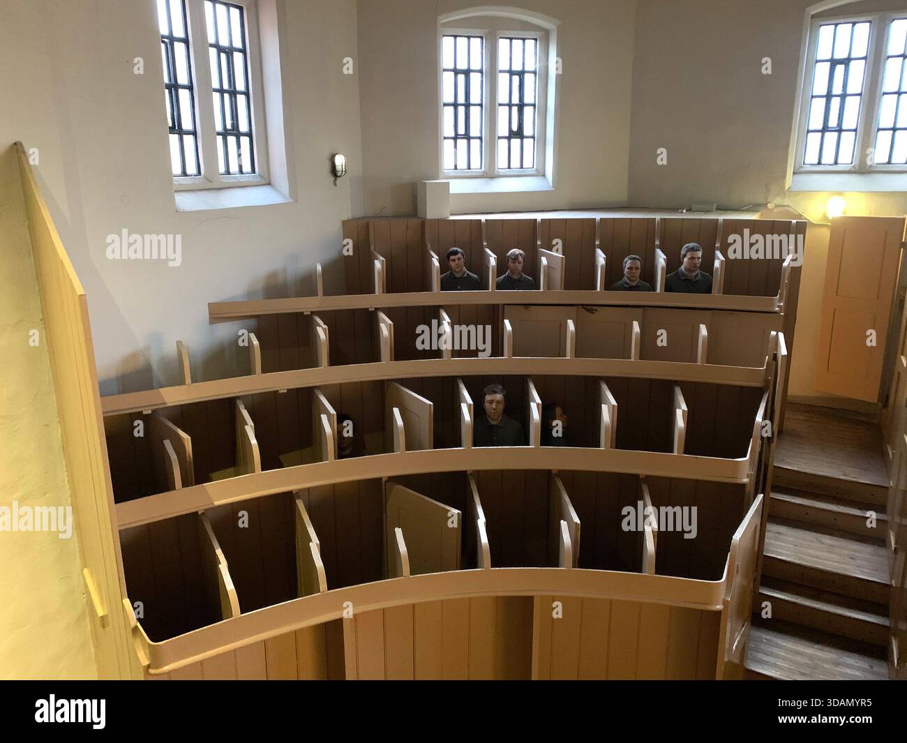 Lincoln Jail Prison Castle Church Chapel old style type prisoners dock god holly Christian service inside female type segregated cell cells gantry in - Smartphone Captured Stock Image