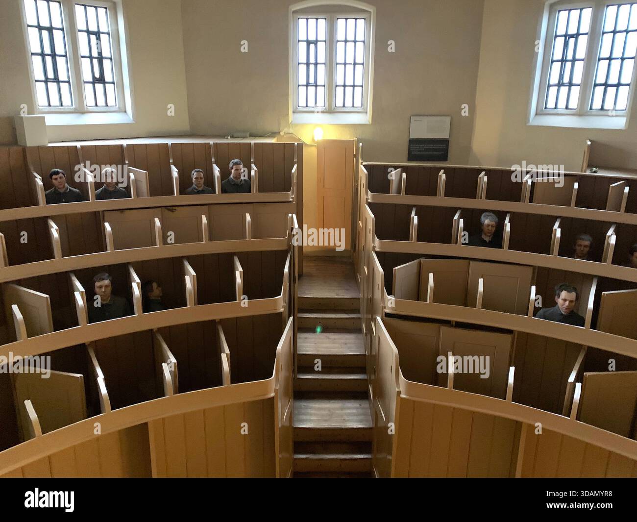 Lincoln Jail Prison Castle Church Chapel old style type prisoners dock god holly Christian service inside female type segregated cell cells gantry in - Smartphone Captured Stock Image