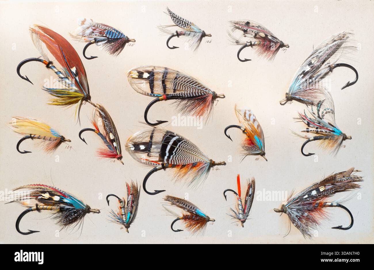 Fish hooks with feathers hi-res stock photography and images - Alamy