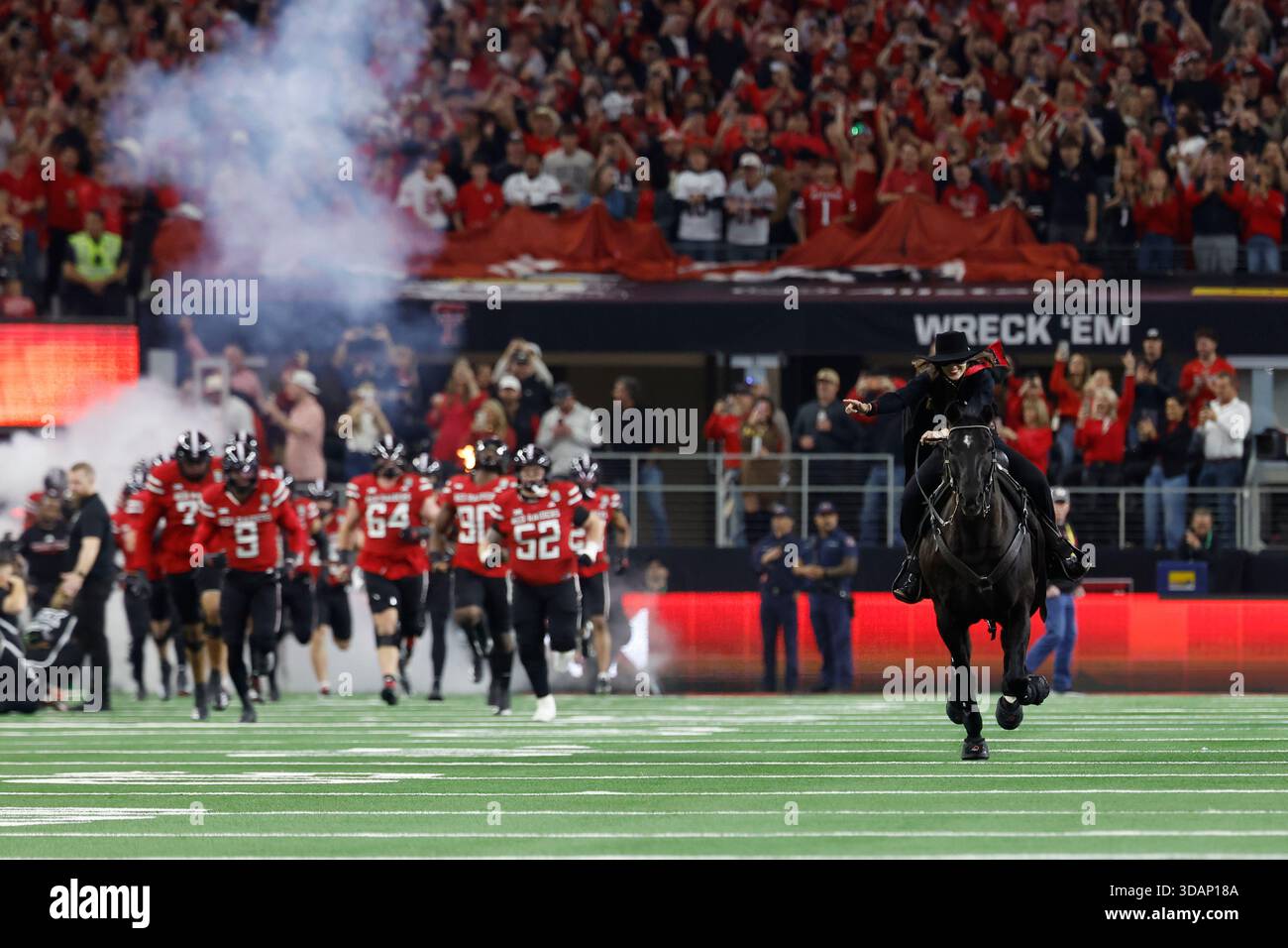 Texas Tech University masked rider takes the field with the football ...