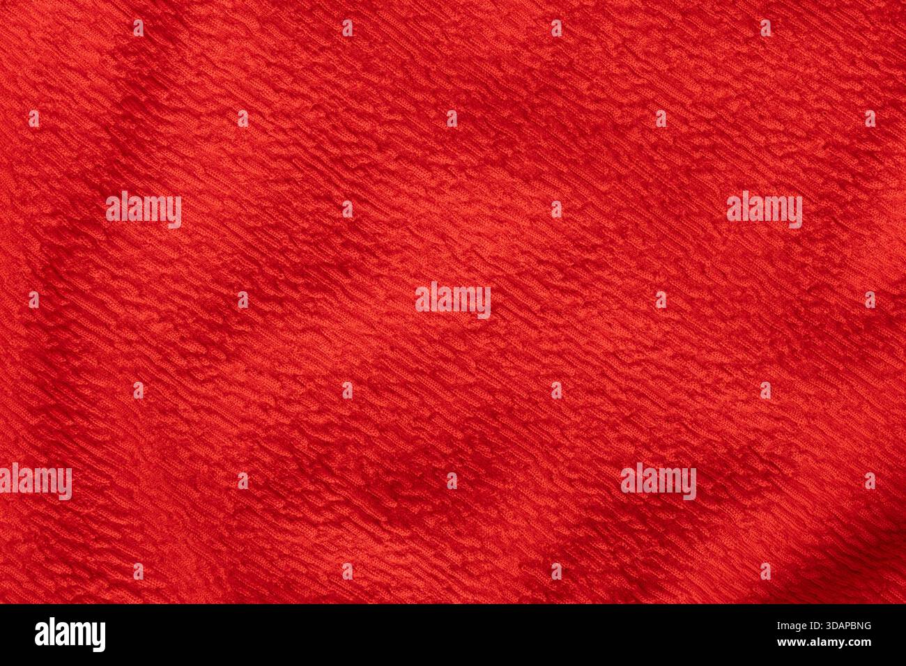 Bright red textured fabric background surface Stock Photo