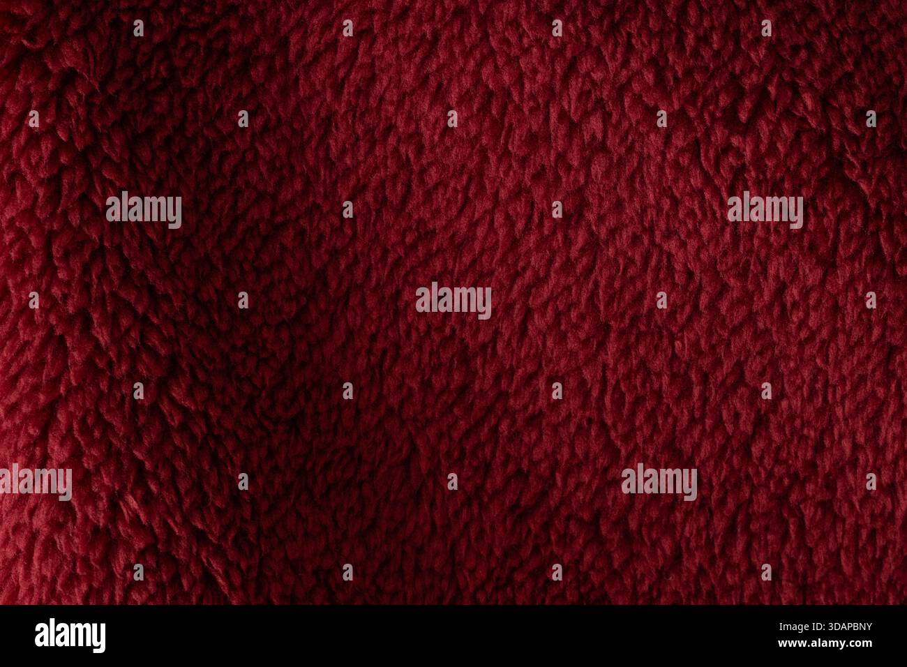 Deep red faux fur texture background Stock Photo