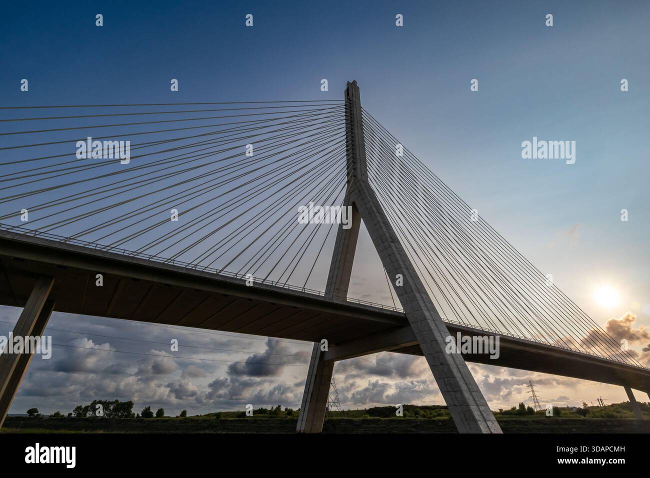 Flintshire bridge cable-stayed pylon and deck beneath dramatic cloud ...