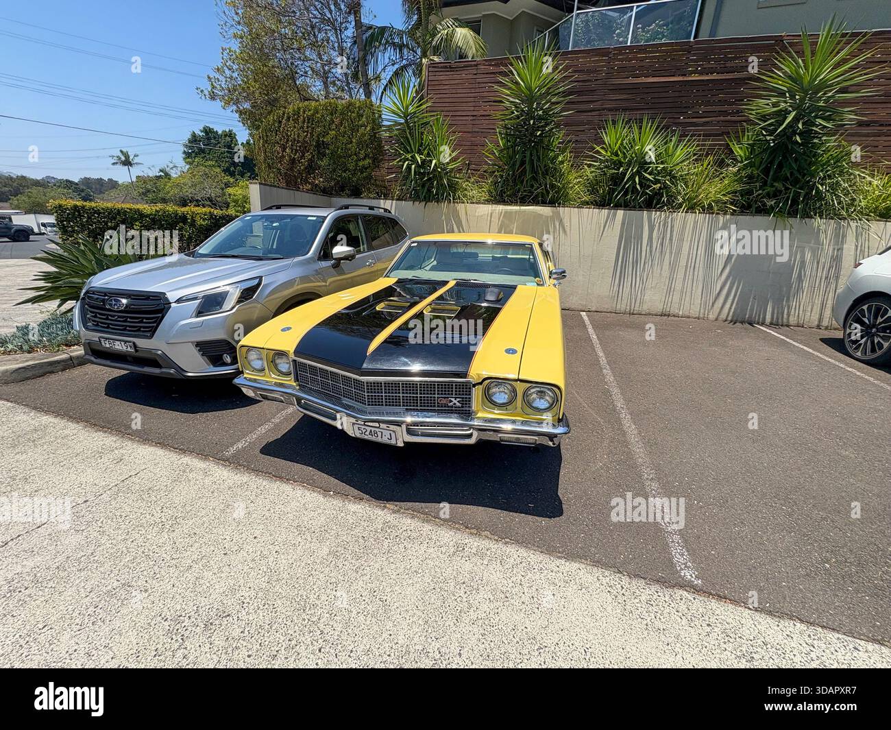 1972 Buick Skylark Coupe GSX model in yellow and black parked outside in Sydney,NSW,Australia - Smartphone Captured Stock Image