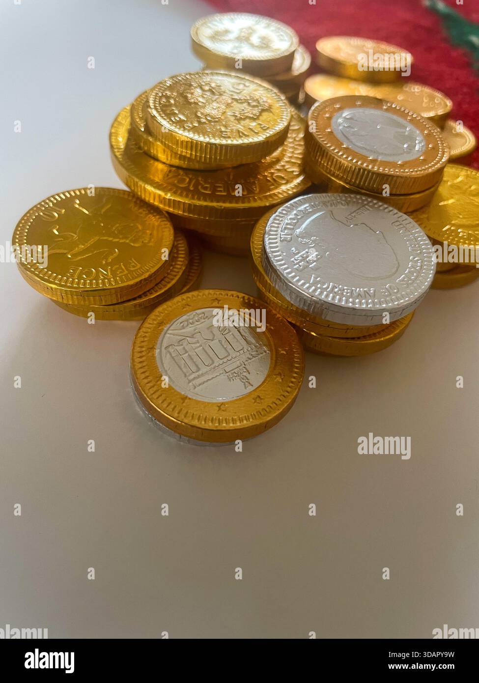 Still Life of Chocolate Foil Wrapped Coins of the World at the Holidays, USA, 2025, USA - Smartphone Captured Stock Image