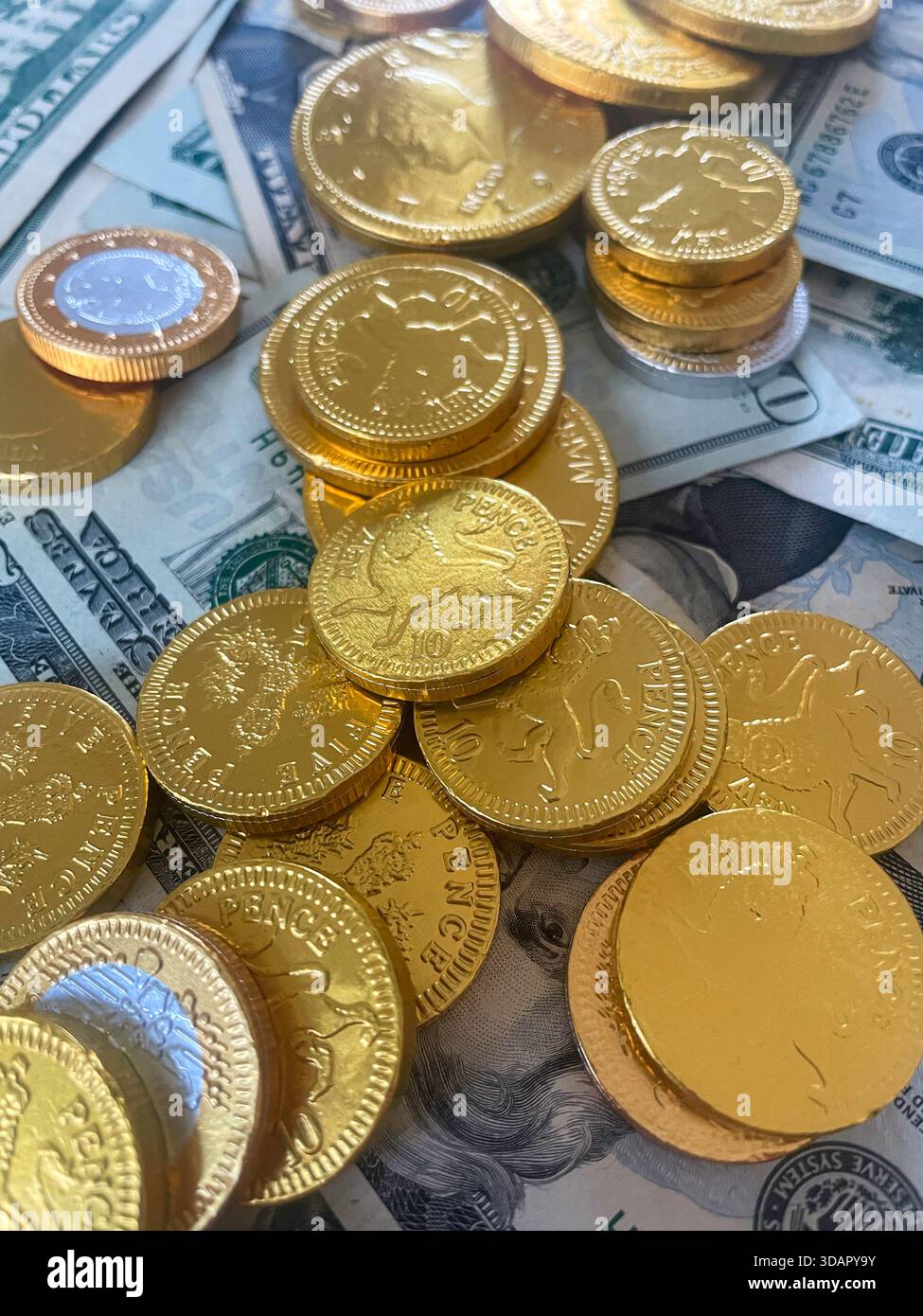 Still Life of Chocolate Foil Wrapped Coins of the World at the Holidays, USA, 2025, USA - Smartphone Captured Stock Image