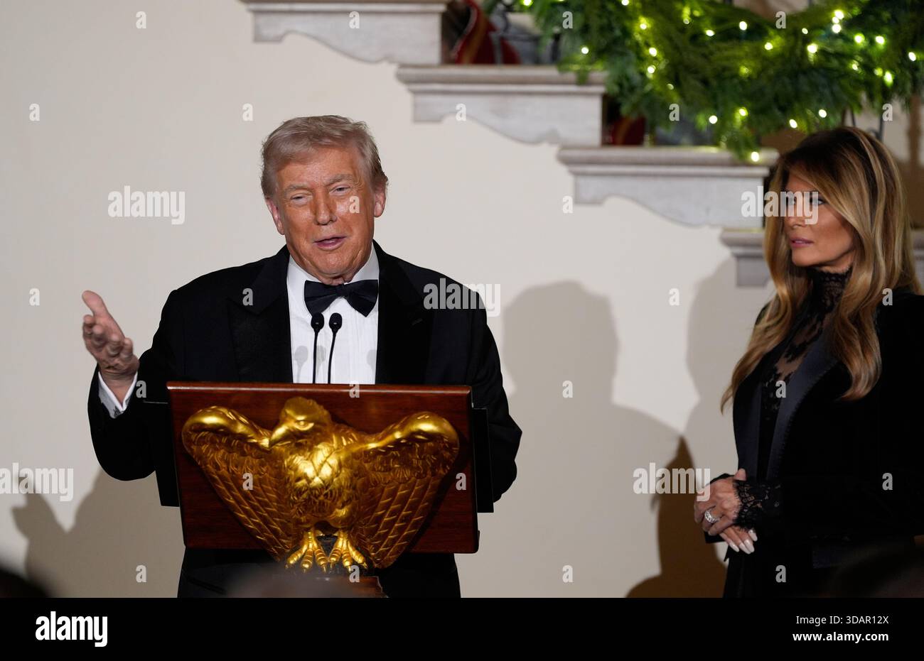 President Donald Trump and first lady Melania greet guests in the Grand ...