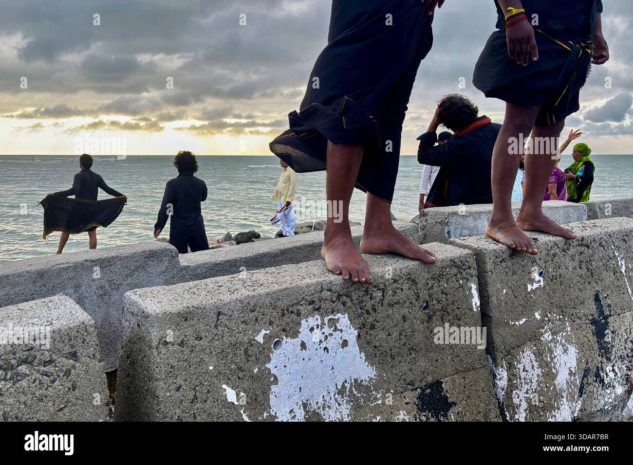 Visitors relax at Ram Setu or Adam's bridge in Arichal Munai, at the ...