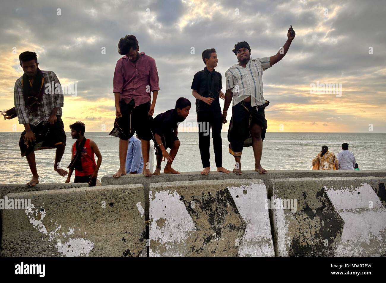 Visitors relax at Ram Setu or Adam's bridge in Arichal Munai, at the ...