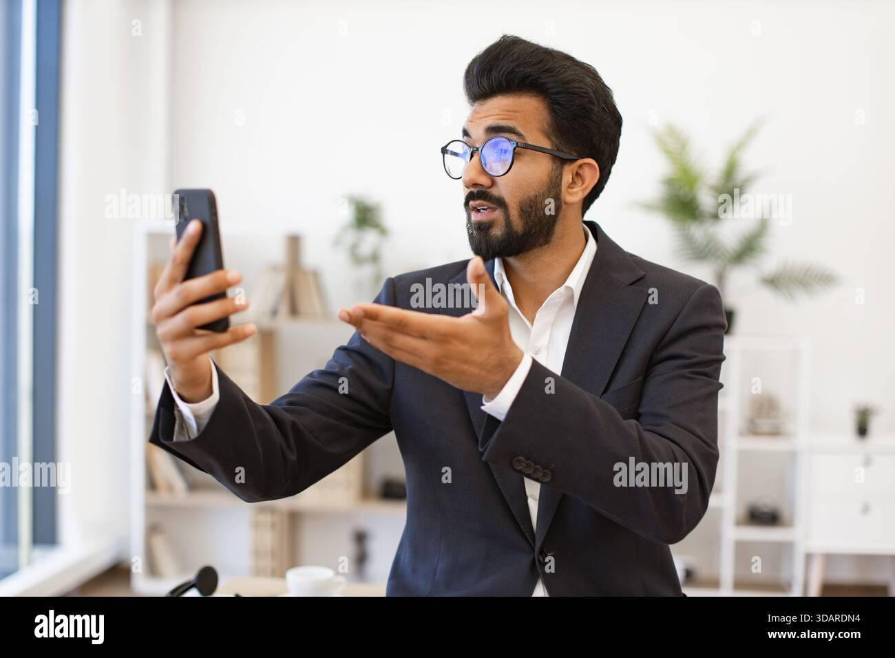 Arab Businessman on Video Call Stock Photo