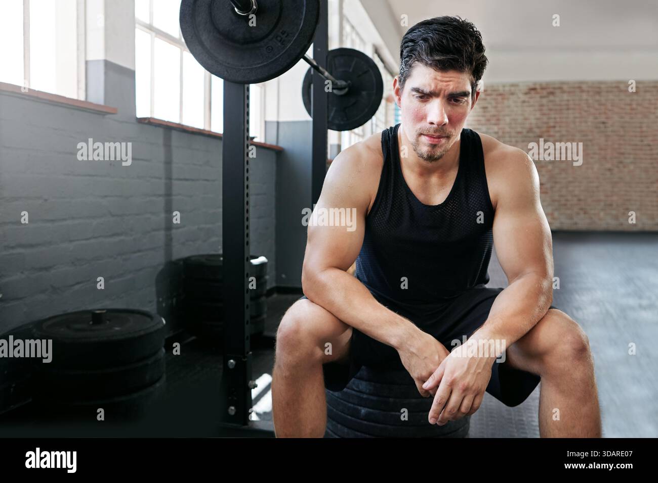 Bodybuilder Thinking Thinking man rest barbell hi-res stock photography and images - Alamy