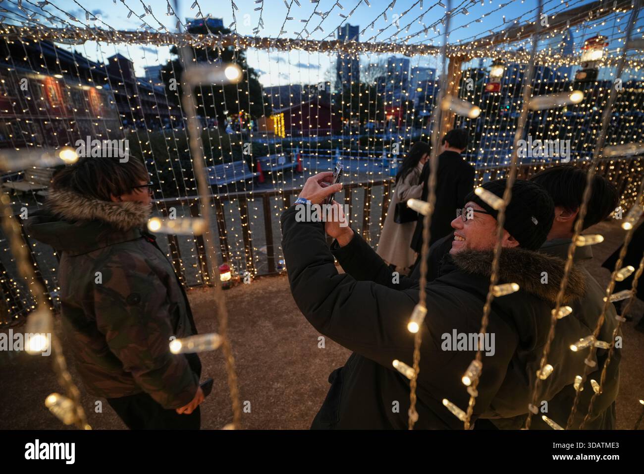 People visit the Christmas Market at Yokohama Red Brick Warehouse ...