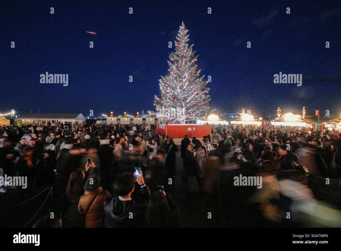 People visit the Christmas Market at Yokohama Red Brick Warehouse ...