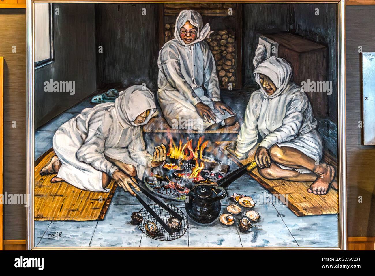A large-scale painting in the Satoumian Ama Hut shows three Ama divers preparing fresh seafood over an open fire during a break between dives. Shima, Mie Prefecture, Japan. Stock Photo