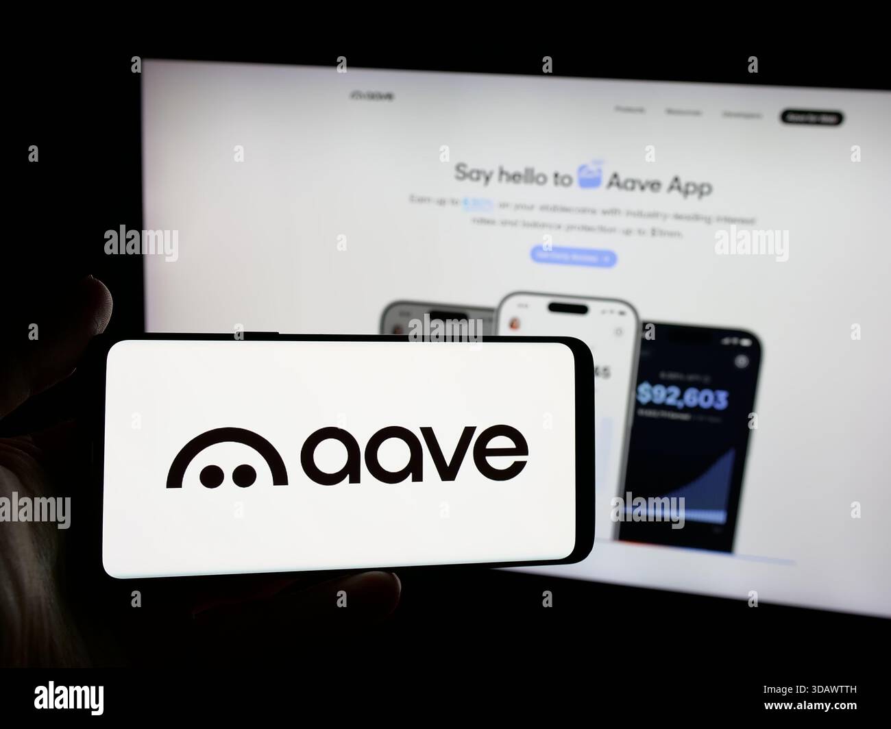 Stuttgart, Germany - 11-30-2025: Person holding smartphone with logo of  British software company Aave Labs on screen in front of website Stock  Photo - Alamy