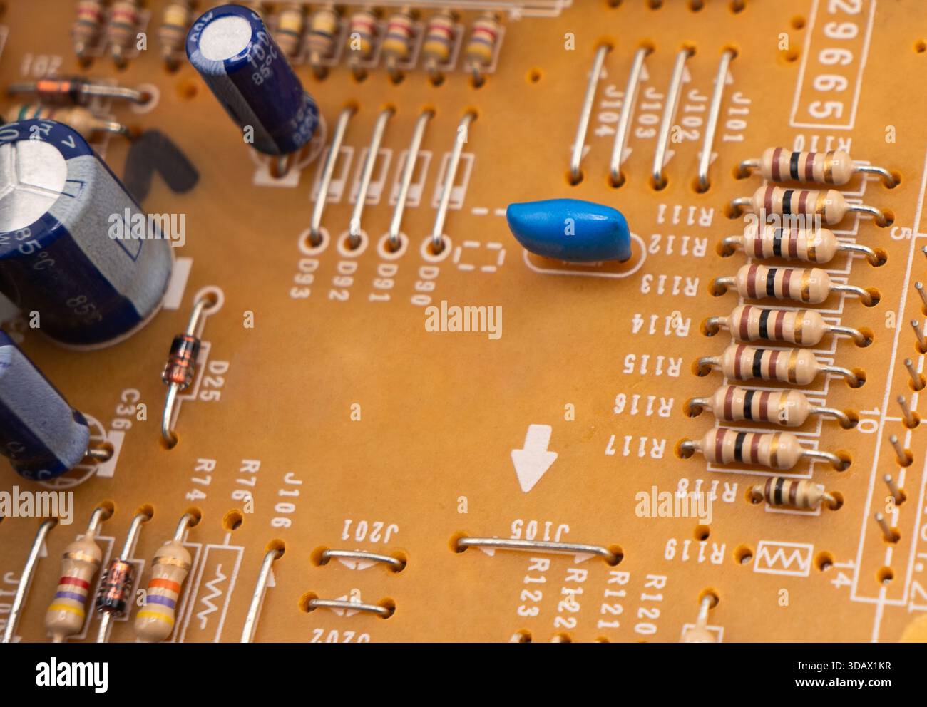 Circuit board with resistors microchips and electronic components background. Computer hardware technology. Stock Photo