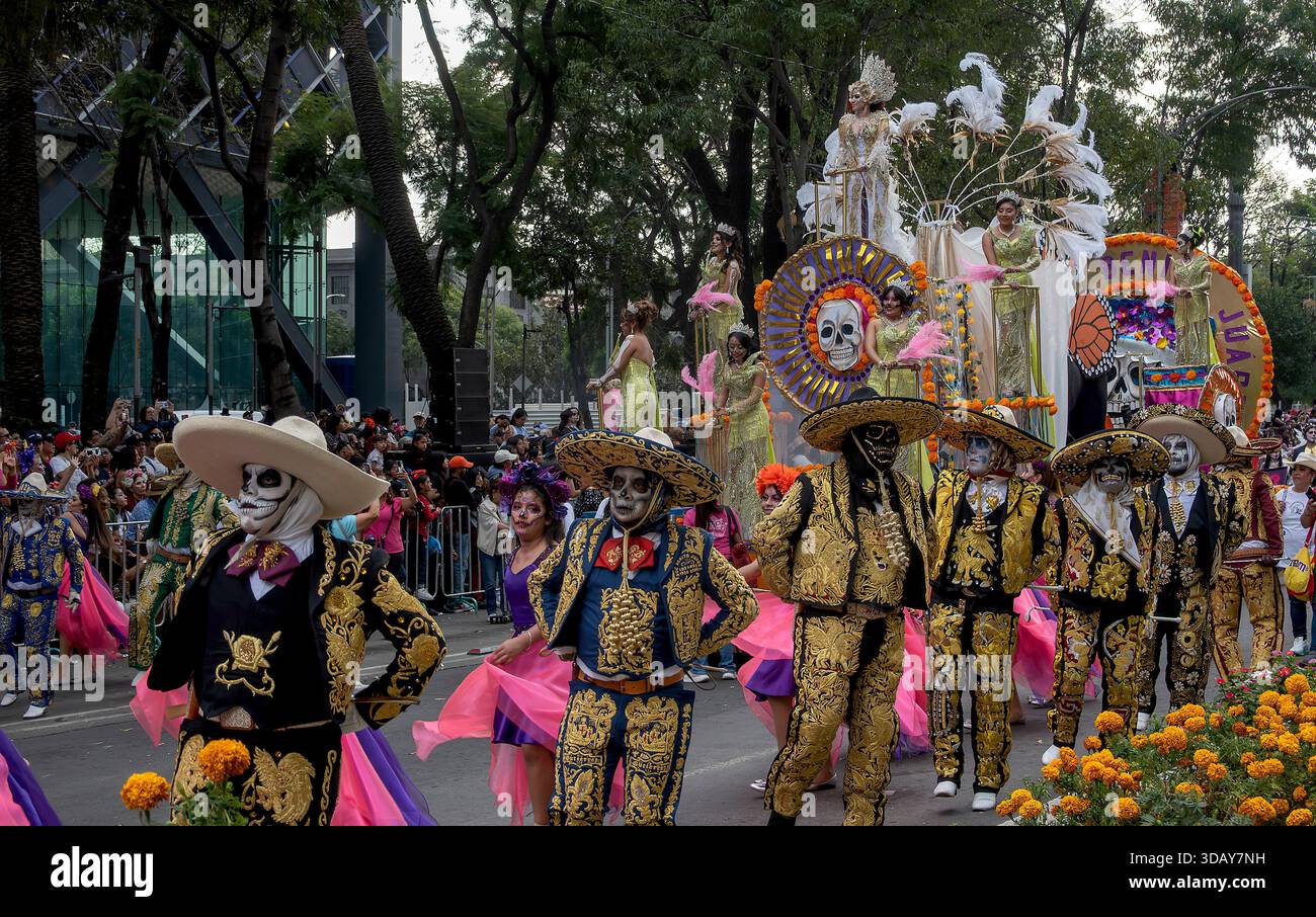 People participate in a Day of the Dead parade in Mexico City, Mexico Stock Photo