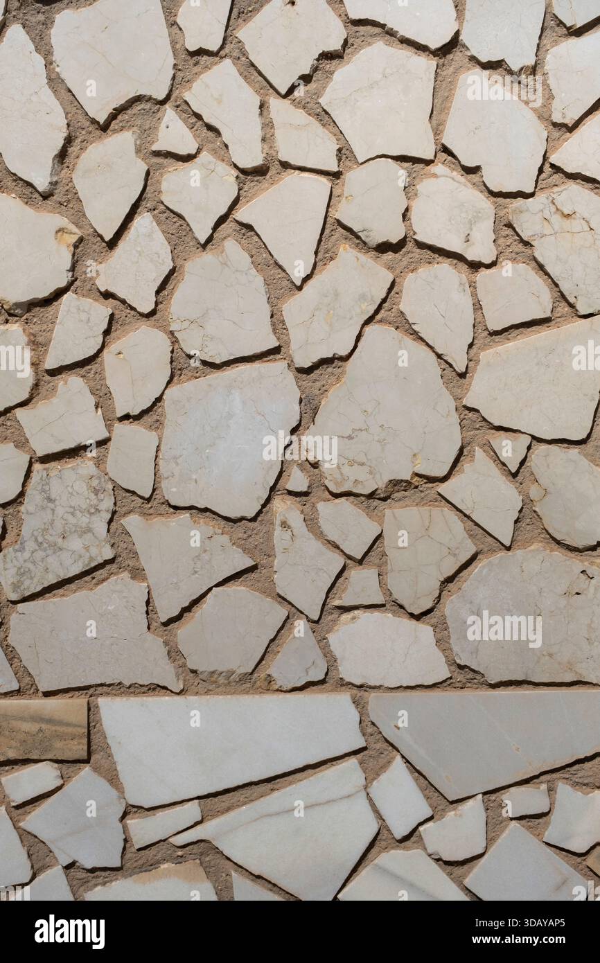 Polished rock stonework wall rustic cladding Stock Photo