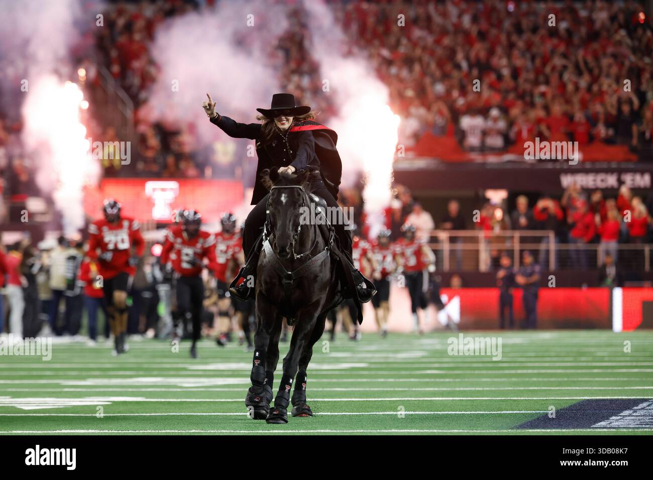 Texas Tech Rider Texas Tech University mascot, the masked rider, takes the field with ...