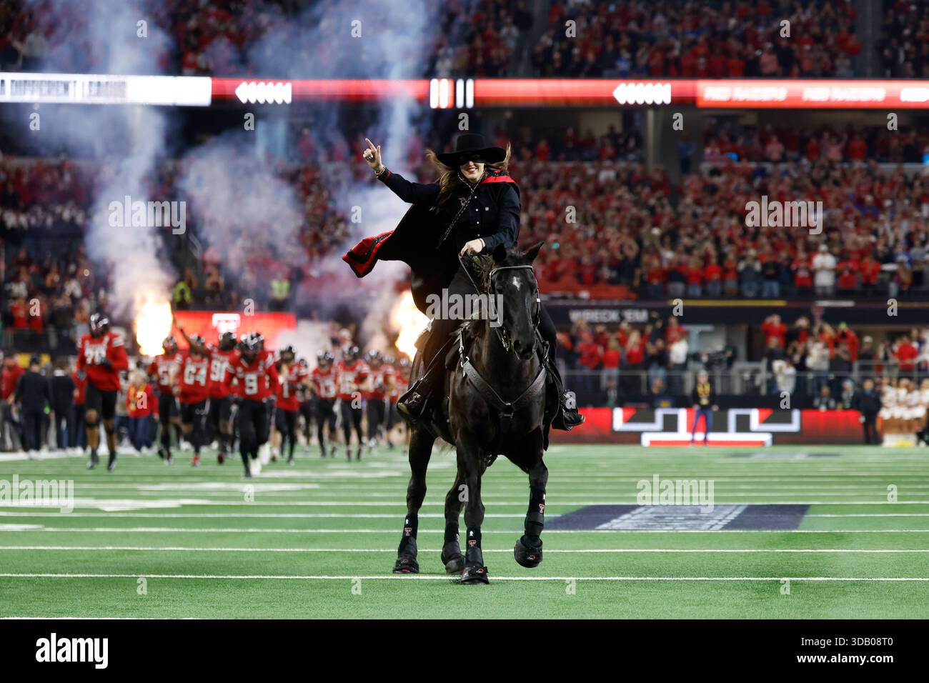 Texas Tech University mascot, the masked rider, takes the field with ...