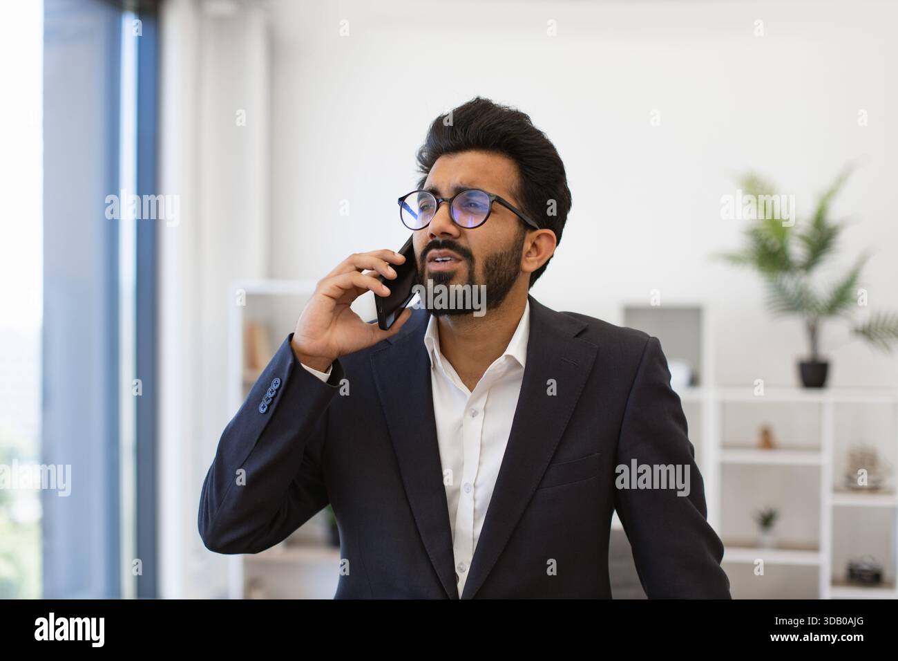 Indian Businessman on Phone Stock Photo
