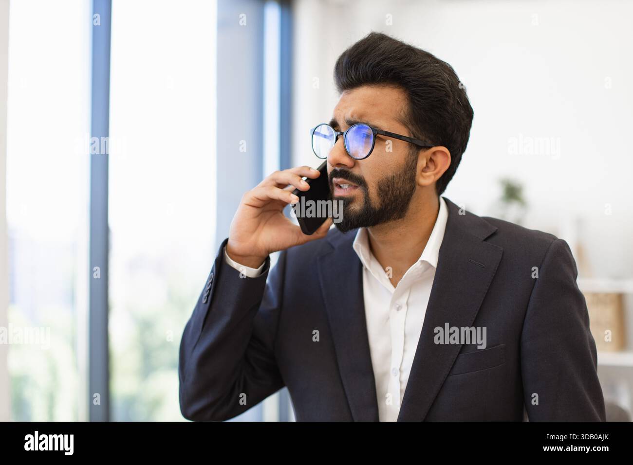 Arab Businessman on Phone Stock Photo