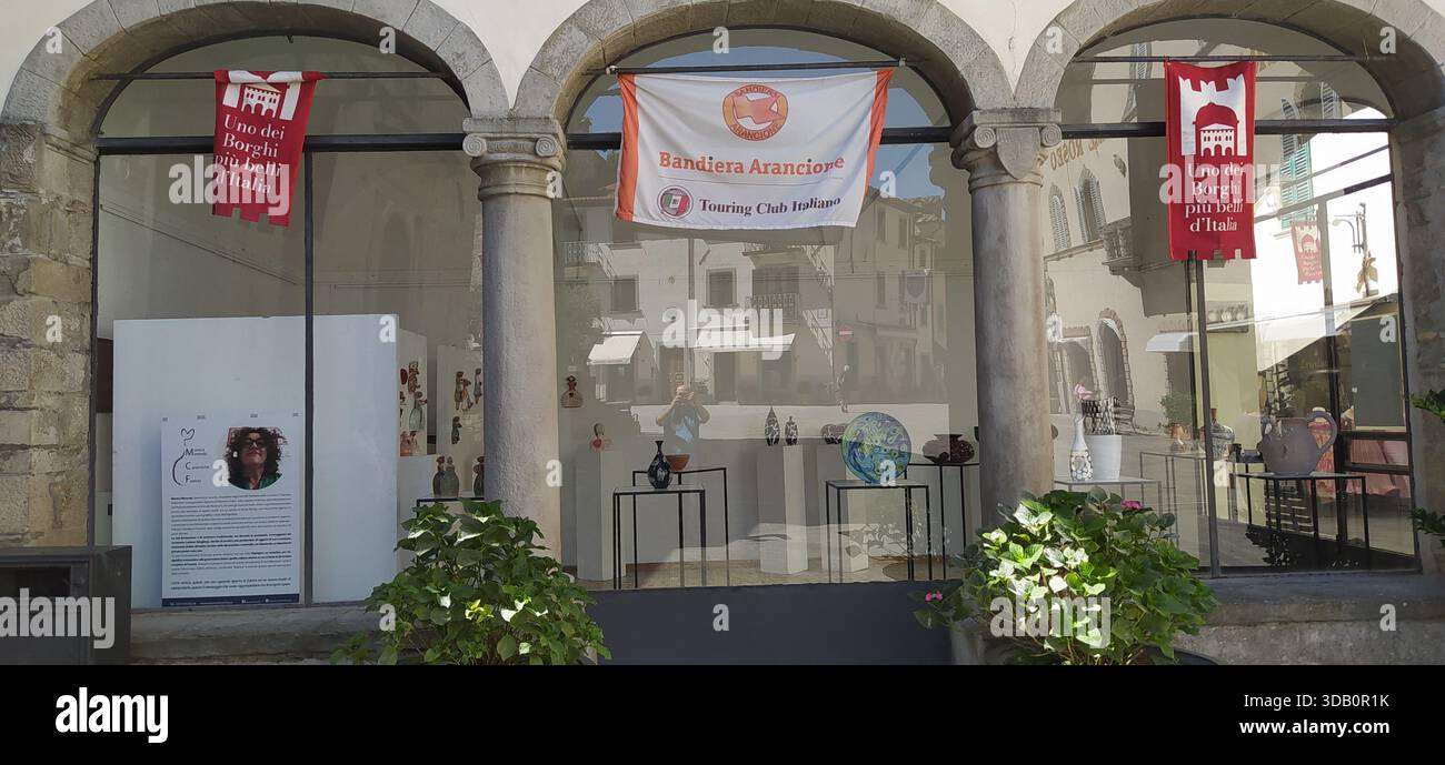 The historic center of Bagno di Romagna with its Italian Touring Club flags - Stock Image