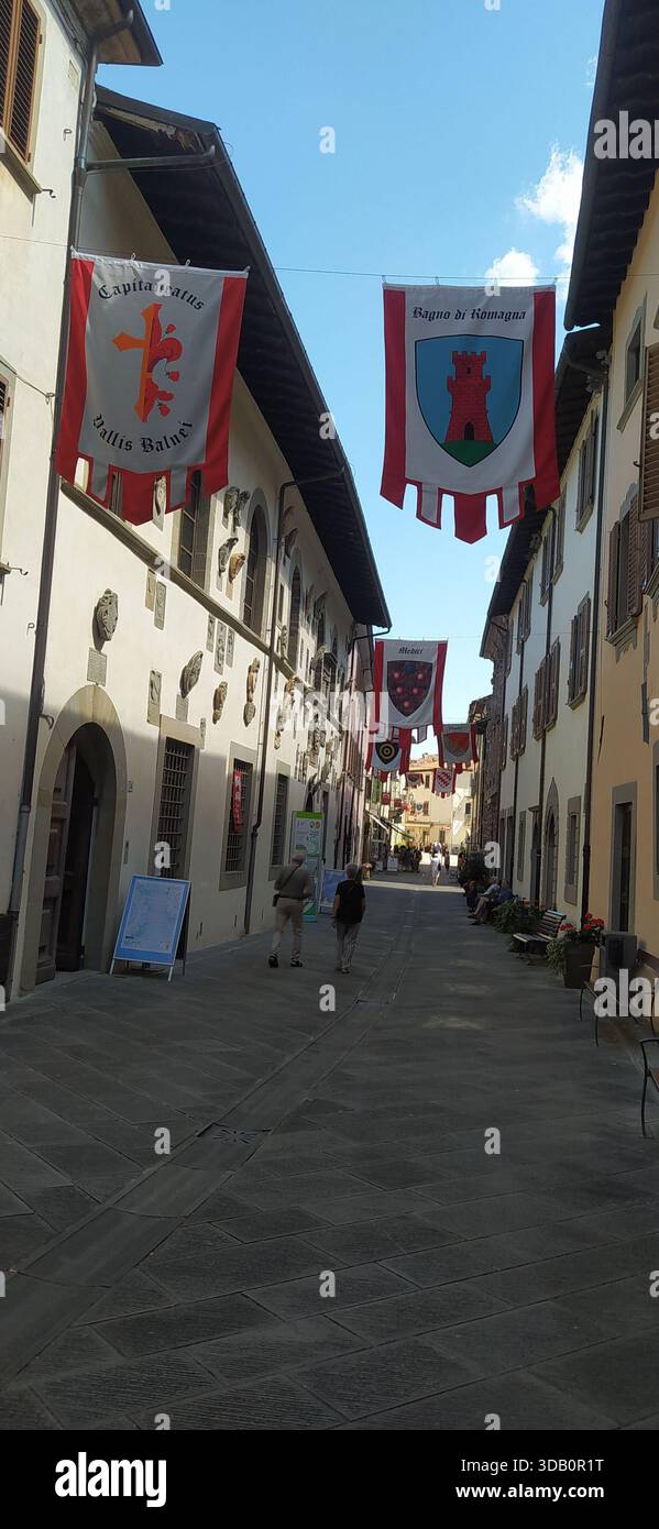 The historic center of Bagno di Romagna with its Italian Touring Club flags - Stock Image