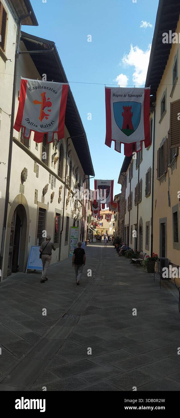 The historic center of Bagno di Romagna with its Italian Touring Club flags - Stock Image