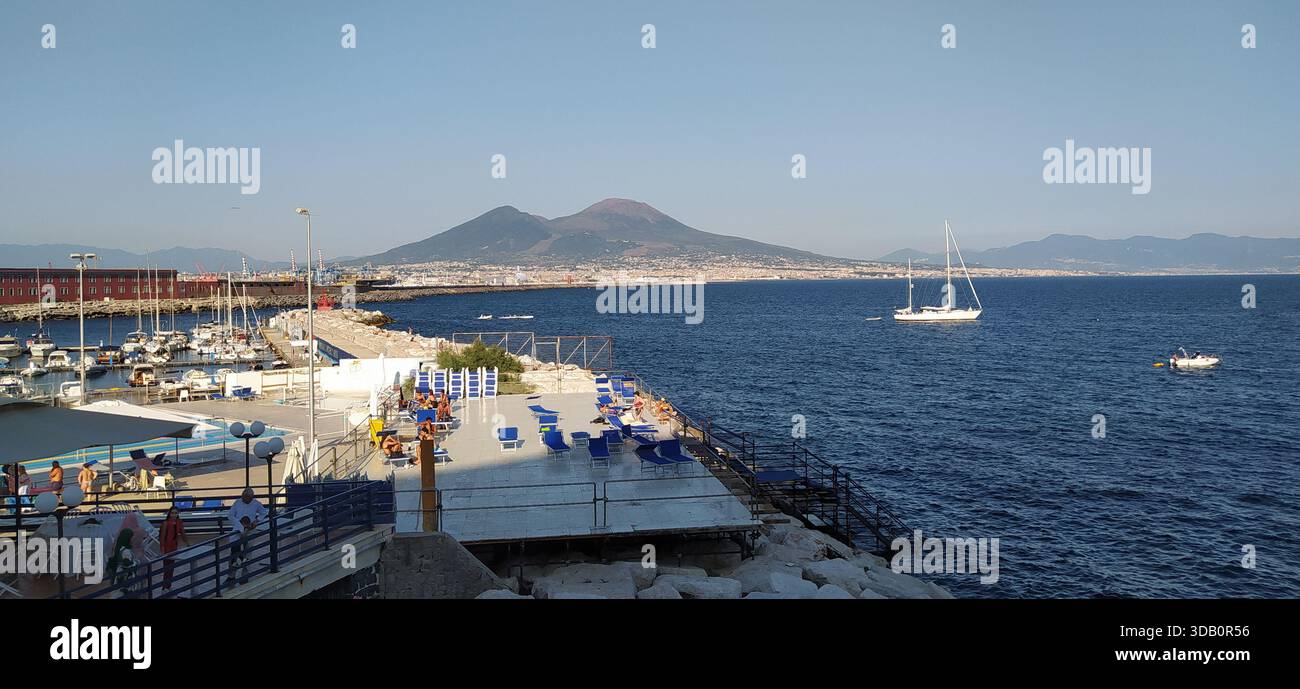The majestic volcano Vesuvius seen from Piazza del Plebiscito. - Stock Image