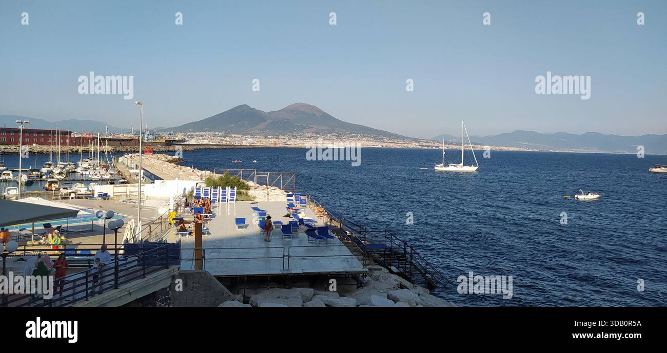 The majestic volcano Vesuvius seen from Piazza del Plebiscito. - Stock Image
