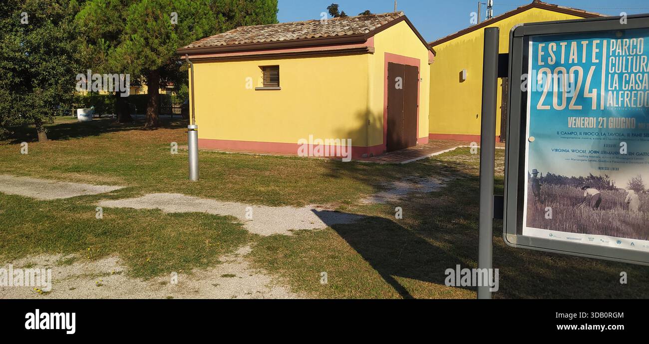 The large tree-lined park and a corner of Finotti near the famous Red House by the writer Alfredo Panzini - Stock Image