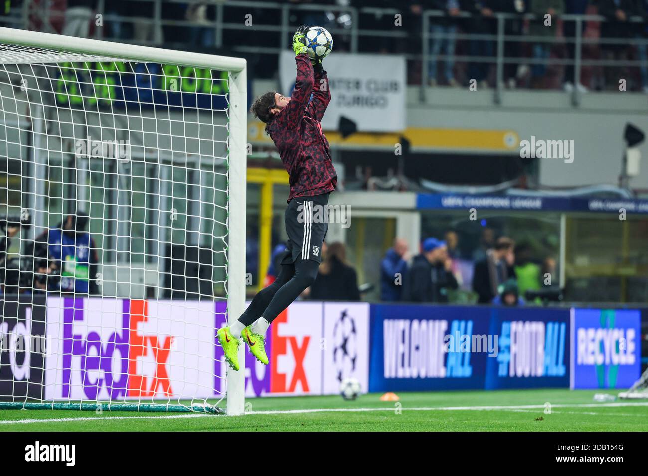 Alisson Becker of Liverpool FC warms up during UEFA Champions League ...