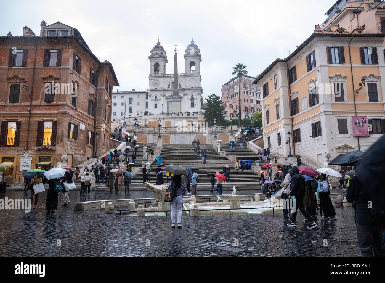 A rainy day at the Spanish Steps, a famous 135-step Baroque staircase ...
