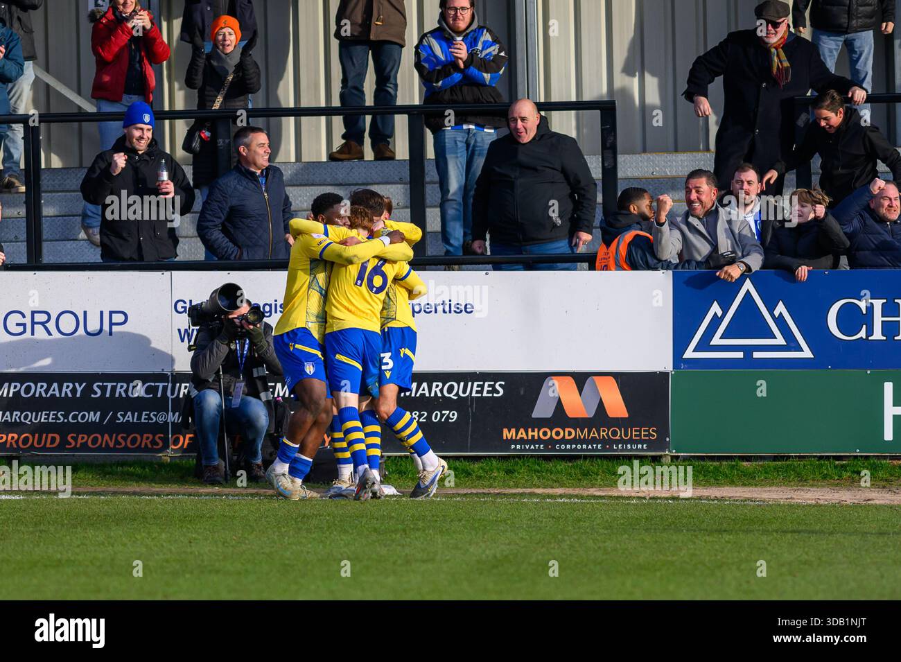 Arthur Read of Colchester United celebrates scoring his side's third ...