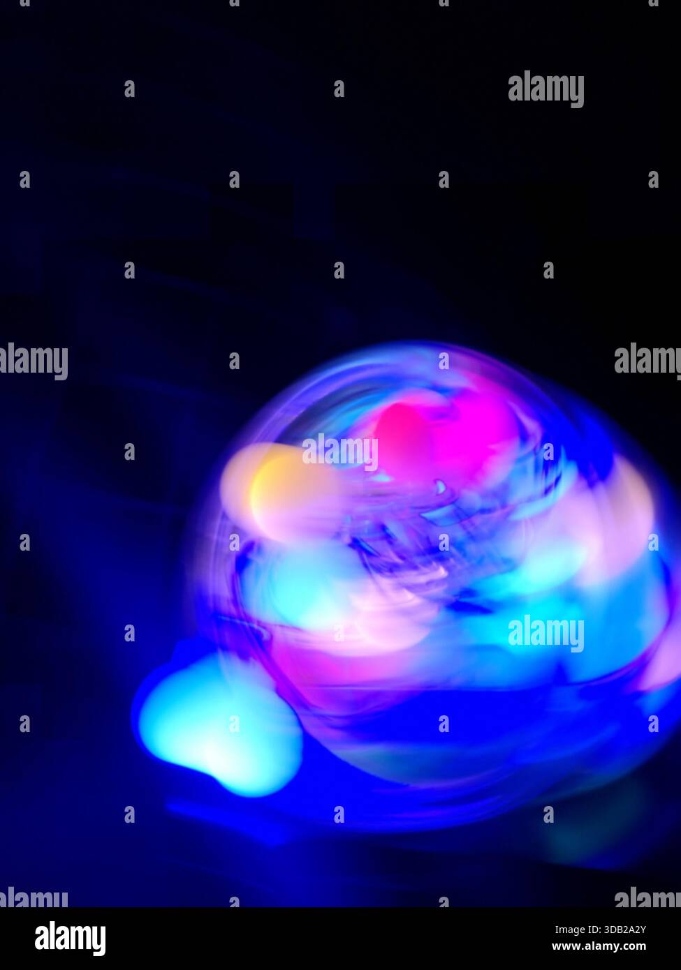Neon brain visualizes data for smart technology, deep learning, and digital intelligence concepts. Represents machine intelligence, data flow, and a s Stock Photo