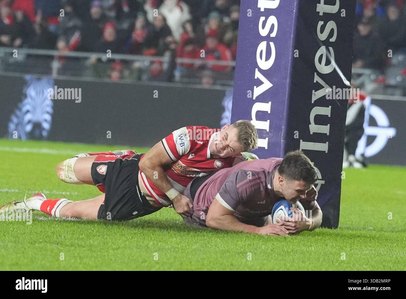 Munster Rugby's Tom Farrell scores his team's fourth try as he is ...