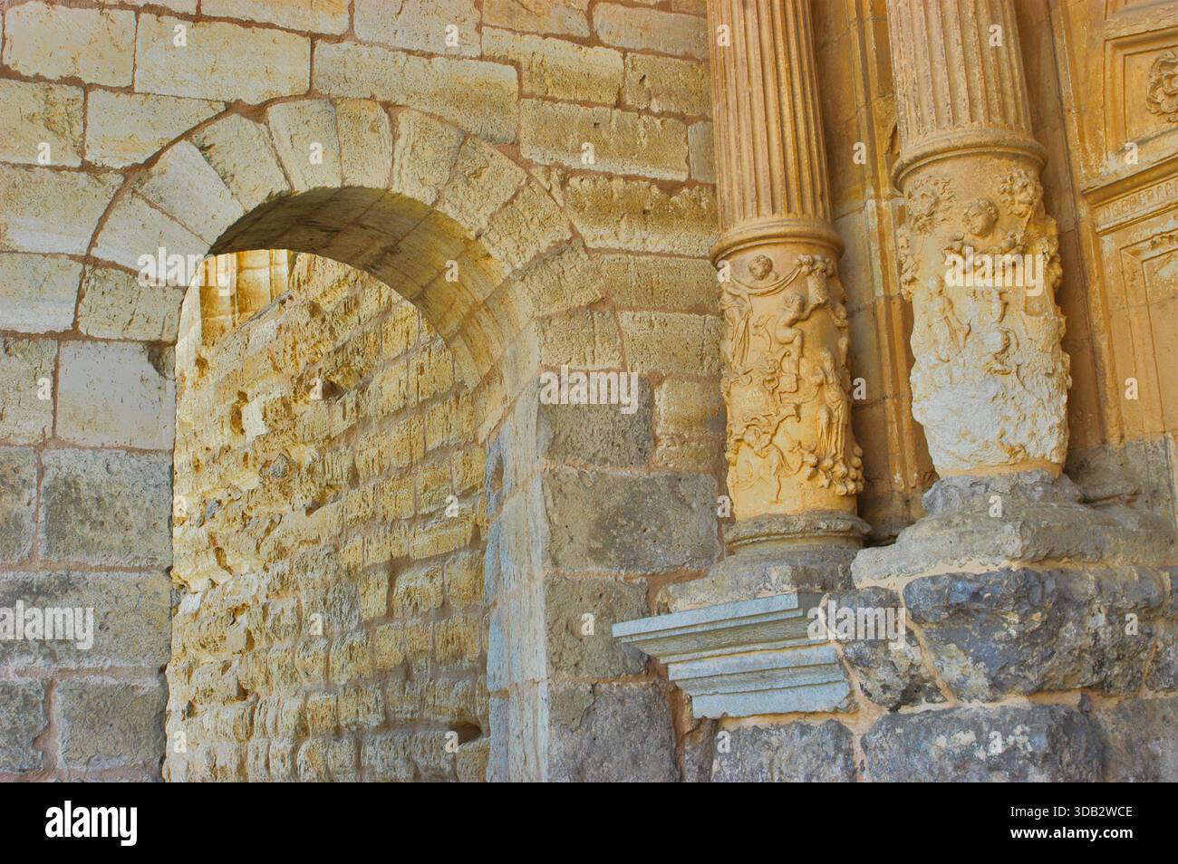 Romanesque Rounded Arh Ancient Romanesque details displaying textured stone walls, a rounded ...