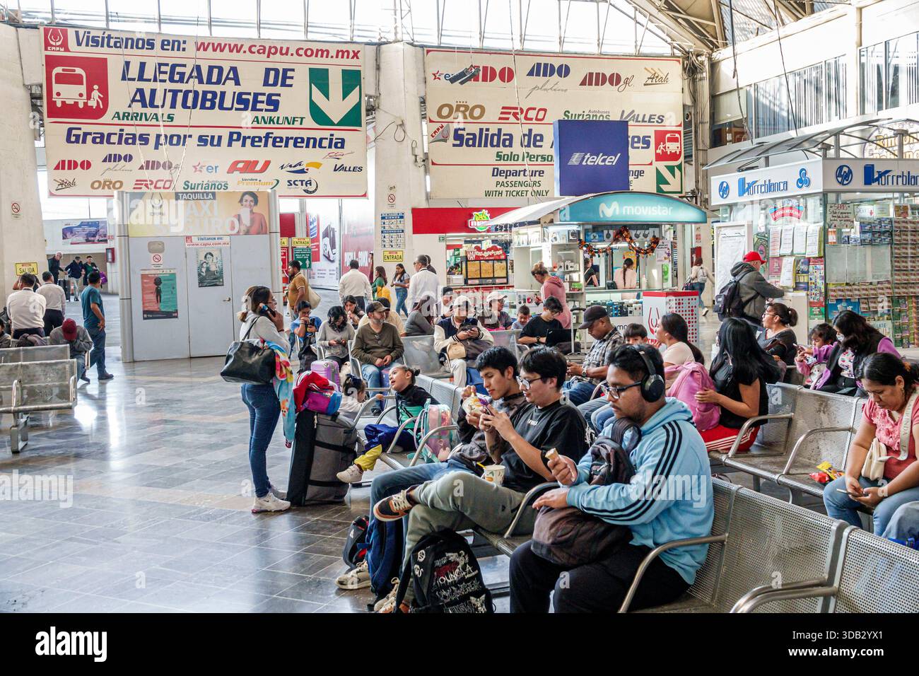 Puebla Mexico,CAPU Central de Autobus de Puebla bus station,inside interior arrivals departures hall,sign Llegada de Autobuses arrivals,Salida de Auto Stock Photo