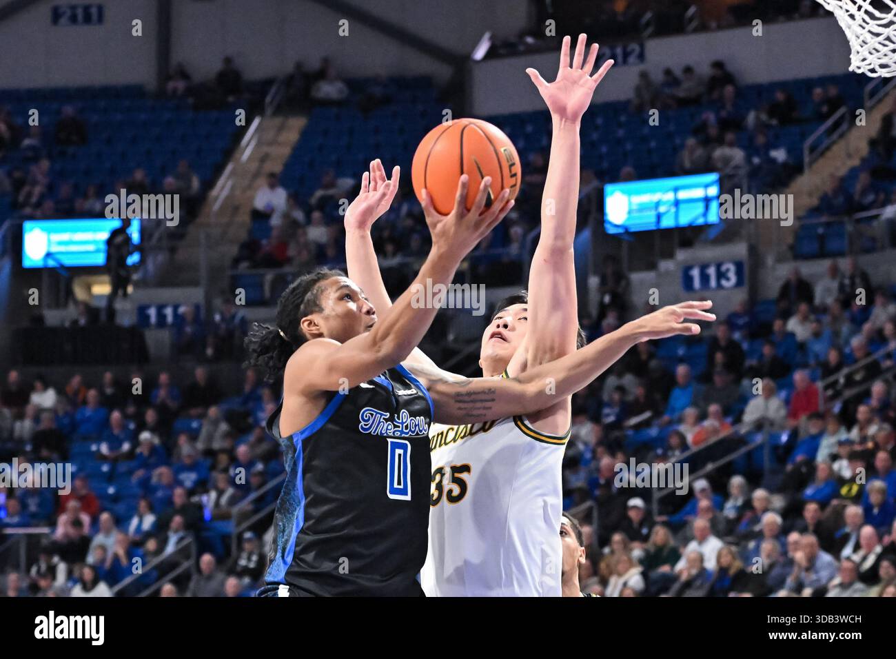 DECEMBER 13, 2025: Saint Louis Billikens guard Kellen Thames (0) blocks ...