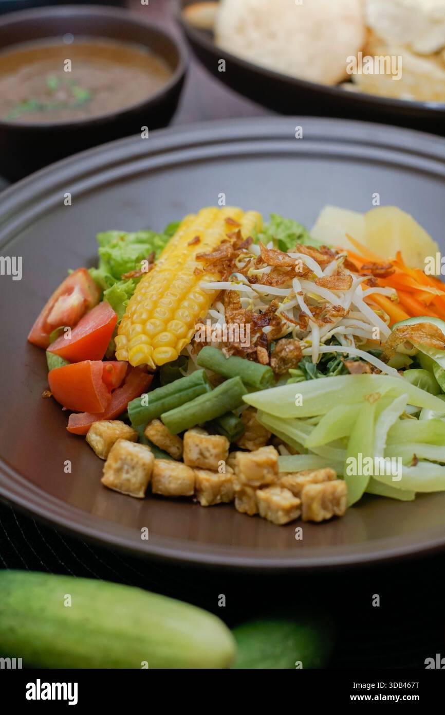 Traditional Indonesian gado gado salad with mixed vegetables, tofu ...