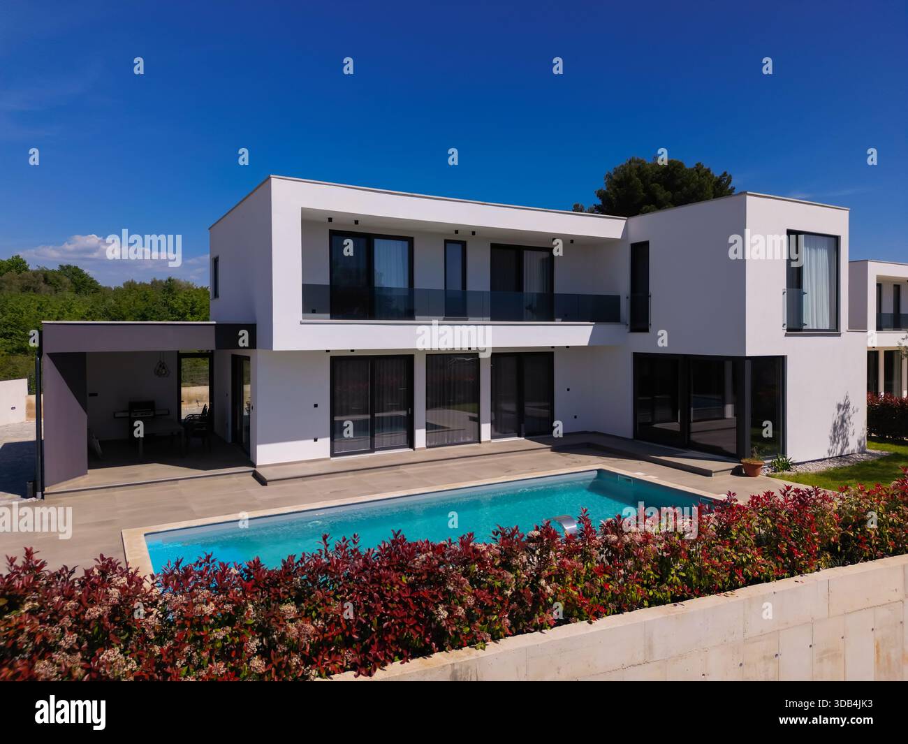 Modern luxury villa with swimming pool and clean minimalist ...