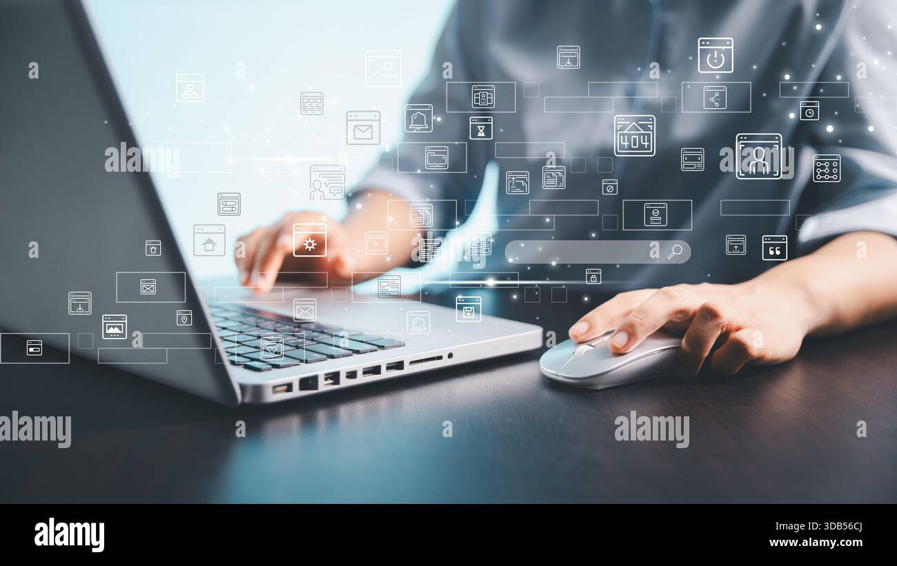 A person using a laptop and computer mouse with floating digital interface icons, representing online technology, data management, web applications an Stock Photo